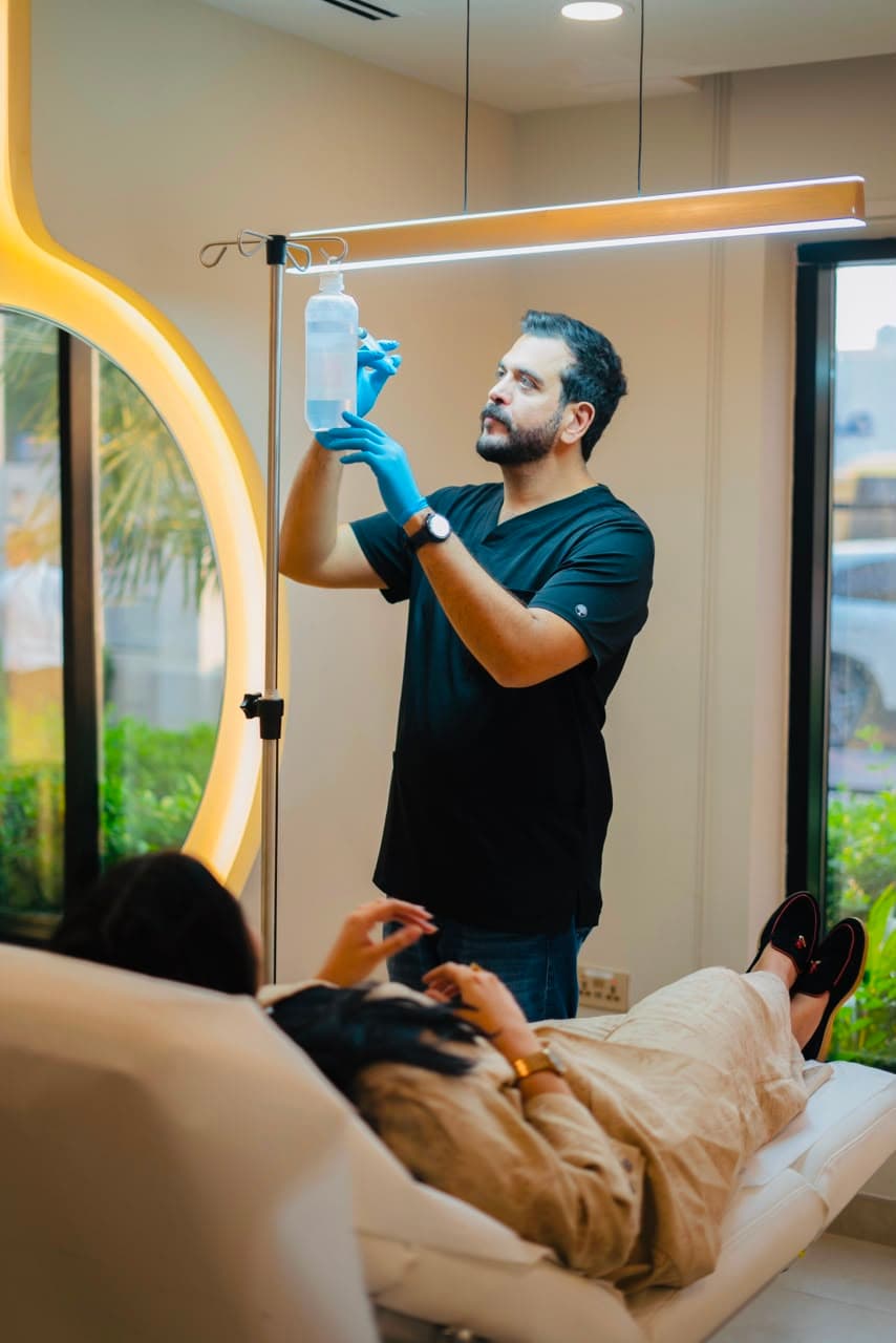 Client receiving IV wellness treatment before an event